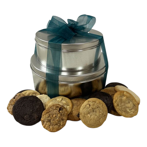 Silver tin wrapped with a dark green ribbon containing a Cookie Tower gift box surrounded by an assortment of gourmet cookies, perfect for birthday or corporate gifts delivered across Canada.