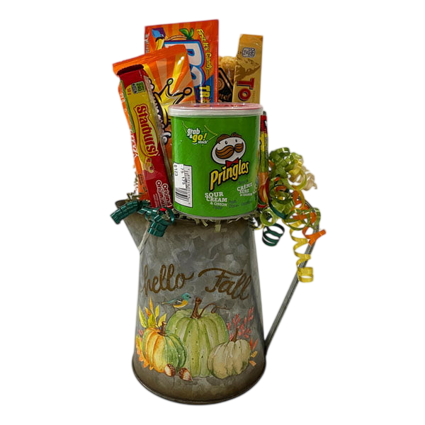 Fall Fun gift basket with caramel popcorn, Pringles, Fuzzy Peaches, Razzles, Toblerone, Lifesavers and Starburst in a metal pitcher planter.